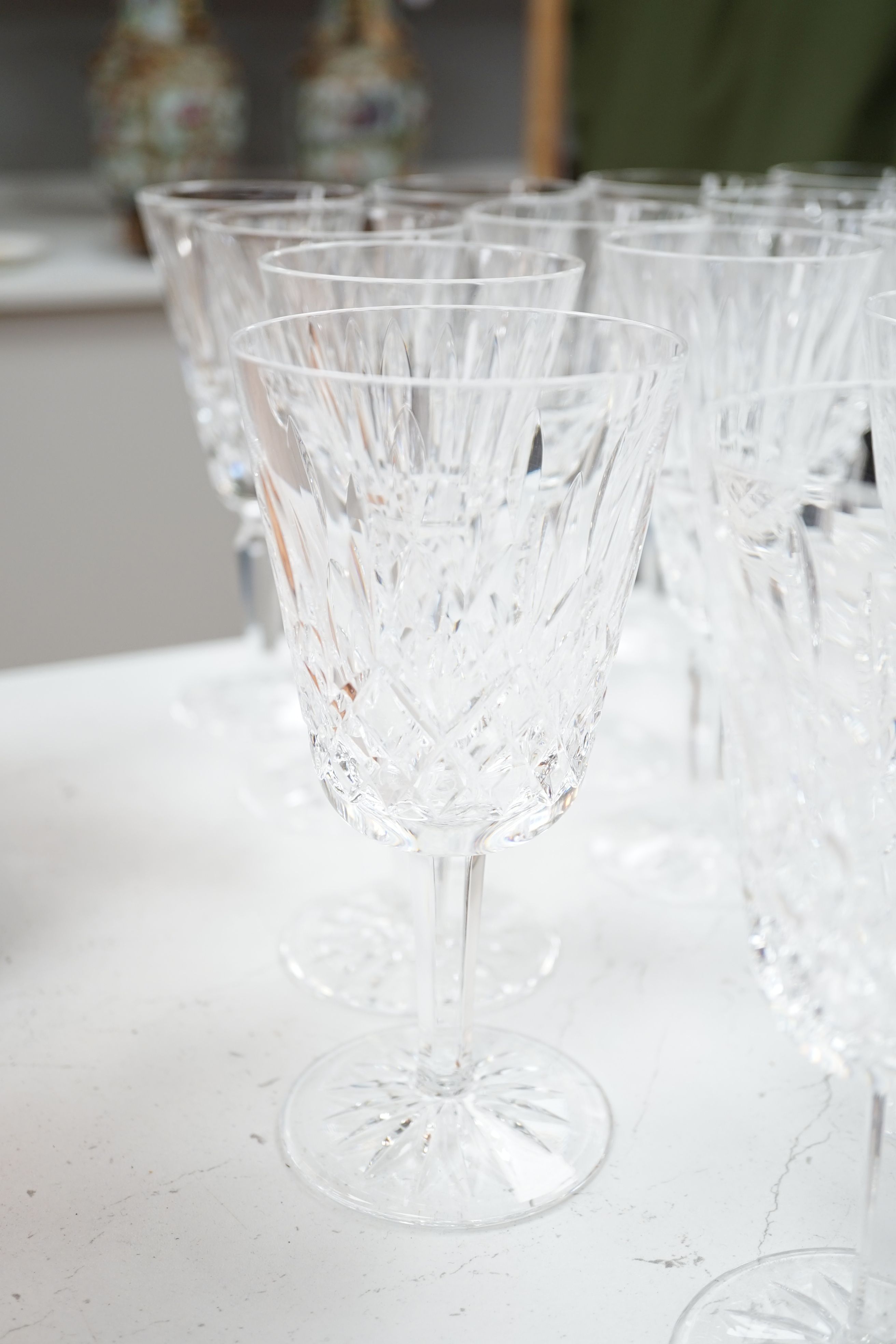 A 68 piece part suite of Waterford cut crystal ‘’Lismore’’ pattern drinking glassware, consisting:- 12 champagne glasses, 9 red wine glasses, 6 white wine glasses, 12 liqueur glasses, 12 whisky tumblers, 12 sherry glasse